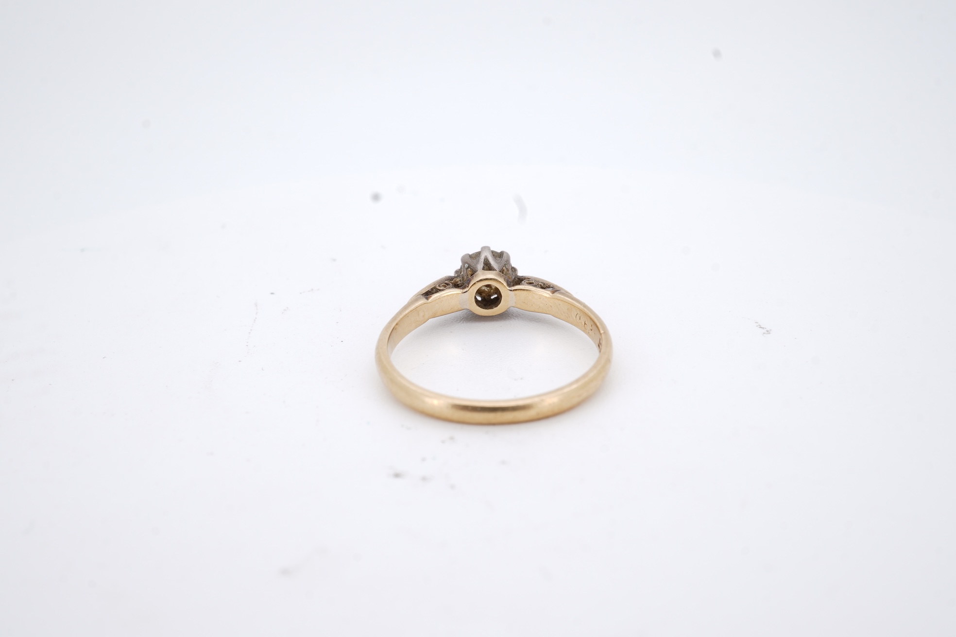 An 18ct and solitaire diamond set ring, the stone weighing approximately 0.30ct, size N, gross weight 2.8 grams.